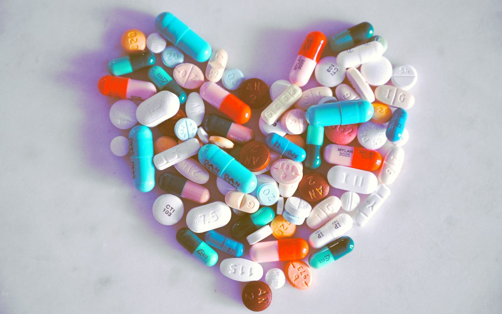 A compiled bunch of pills shaped into a heart