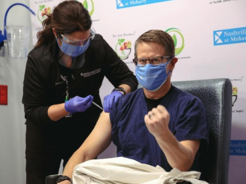 Man receives Covid vaccine